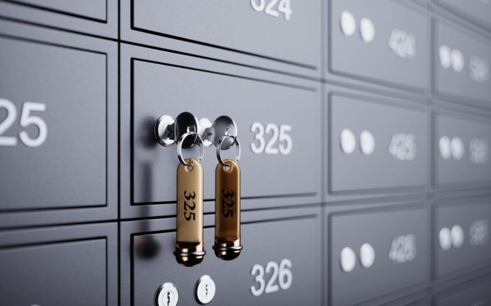 Deposit box with key and golden label Deposit box with key and golden label. 3d rendering illustration